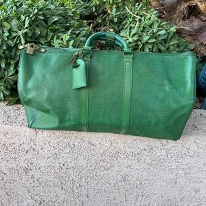 Green Louis Vuitton Epi Green Duffle 55.